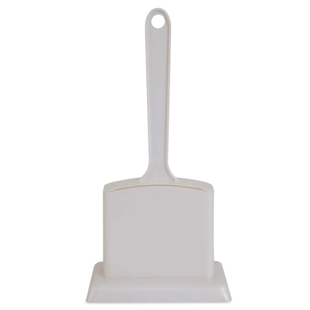 The Petmate Handy Stand Litter Scoop by Petmate is a white plastic scoop with a long handle and wide flat base for effective debris collection. A convenient hole in the handle allows for easy hanging and sanitary storage, helping maintain tidiness.