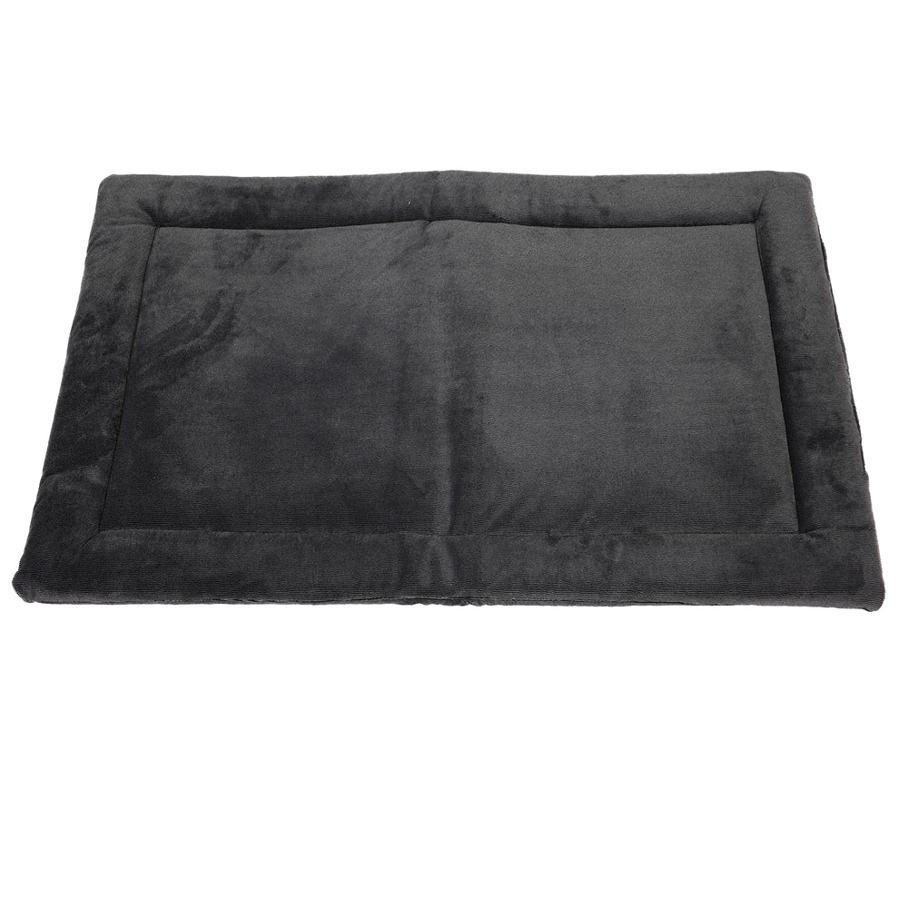 The Petmate Kennel Mat by Petmate is a rectangular, dark gray plush pet bed with raised edges and a non-skid bottom for stability, shown against a white background.