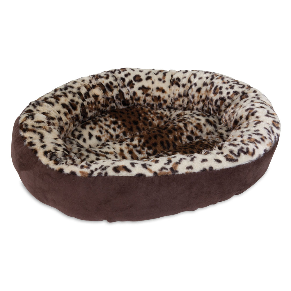 The Aspen Pet Round Animal Print Small Pet Bed by Aspen Pet features a plush oval design with a leopard print interior and brown exterior, offering raised edges and a soft, fluffy texture to satisfy your pets nesting instincts.