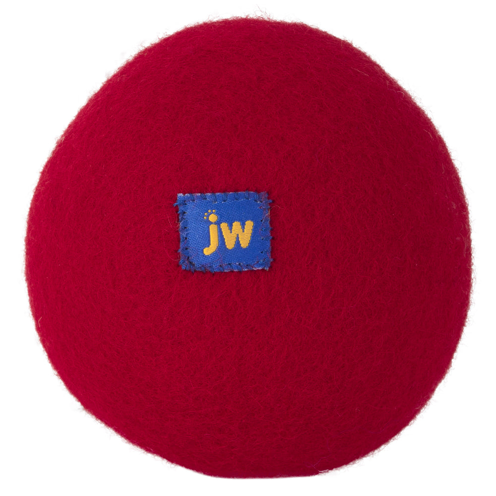 Introducing the JW Wool-ee Ball: A round, red textured toy with a central blue patch featuring jw in yellow. This biodegradable, antimicrobial toy is ideal for eco-conscious playtime, combining excitement with sustainability.