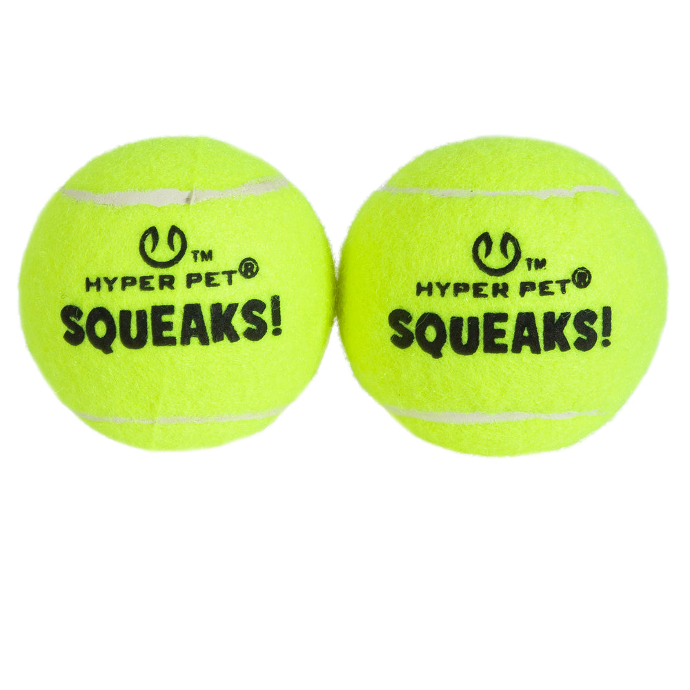 Two bright yellow Hyper Pet Squeaks! Tennis Balls, branded as Hyperpet, sit together featuring the logo above HYPER PET™ SQUEAKS! in black text. They are perfect for Hyper Dog Ball Launchers or enhancing playtime with their Tuff Squeaker design.