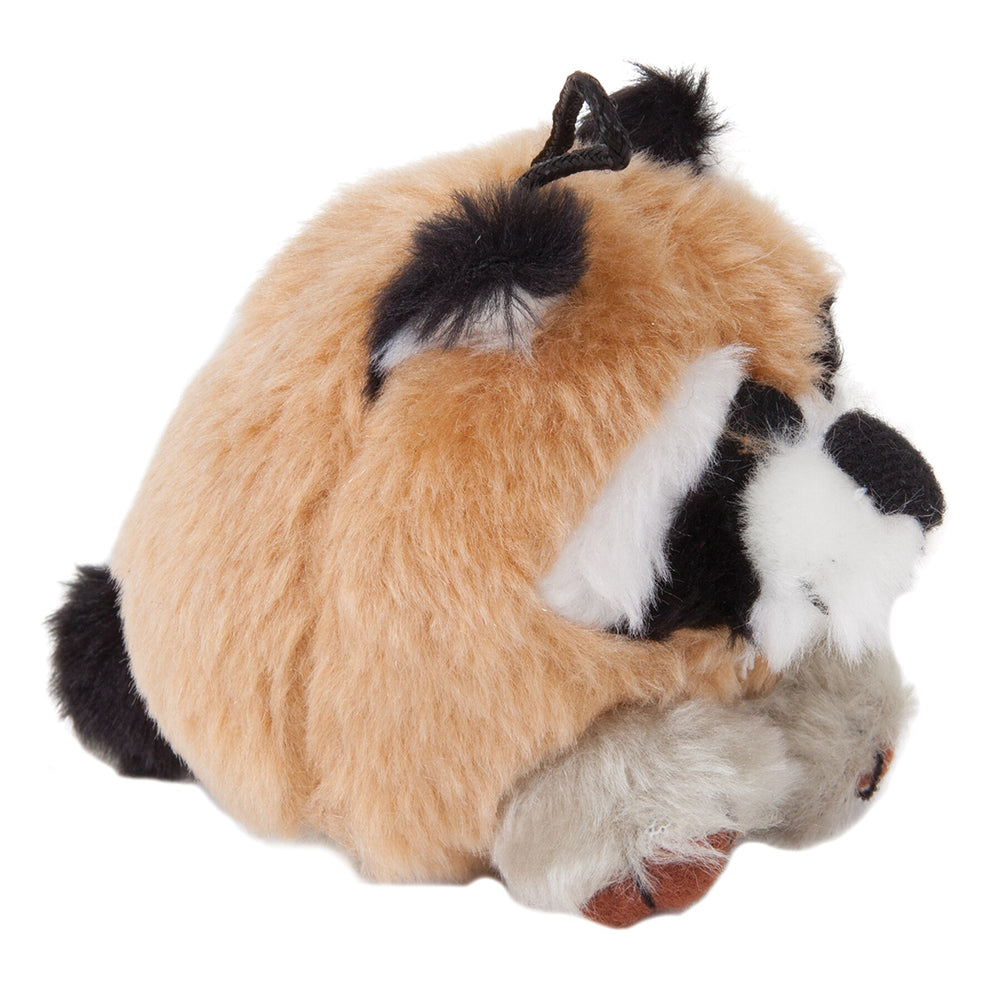 The Zoobilee Raccoon Squatters Plush Dog Toy, with its red panda-like design, features a side view with brown, black, and white fur. Complete with small ears and a tail, this durable plush includes a squeaker and offers both cuddly charm and resilient fun for playtime.