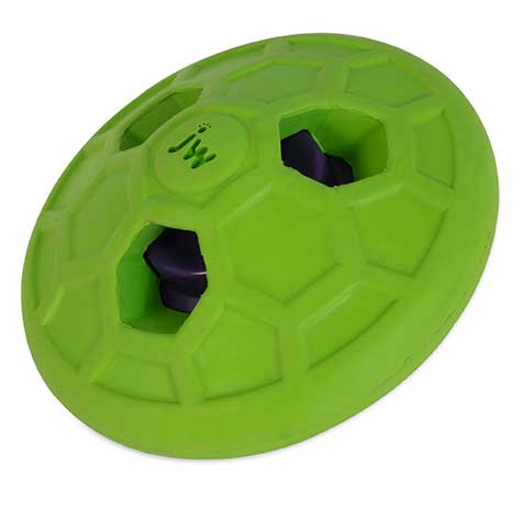 The JW Natural Sounds Rumbler Dog Toy by Jw is green with a hexagonal pattern, designed for work-from-home environments. It features holes and has visible treats inside.