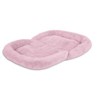The Petmate Puppy Bolster Mat by Petmate is a pink rectangular mat featuring ultra-soft plush texture and raised edges for comfort. Its quilted sleeping area and non-skid bottom provide a cozy, safe resting spot for pets.