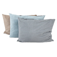 The Aspen Pet Classic Stripe Pillow Dog Bed, stacked with overlapping beige, light blue, and gray stripes on micro-terry plush fabric, is perfect for home decor or lounging. Its soft touch is ideal for pets and it’s machine washable for easy care.