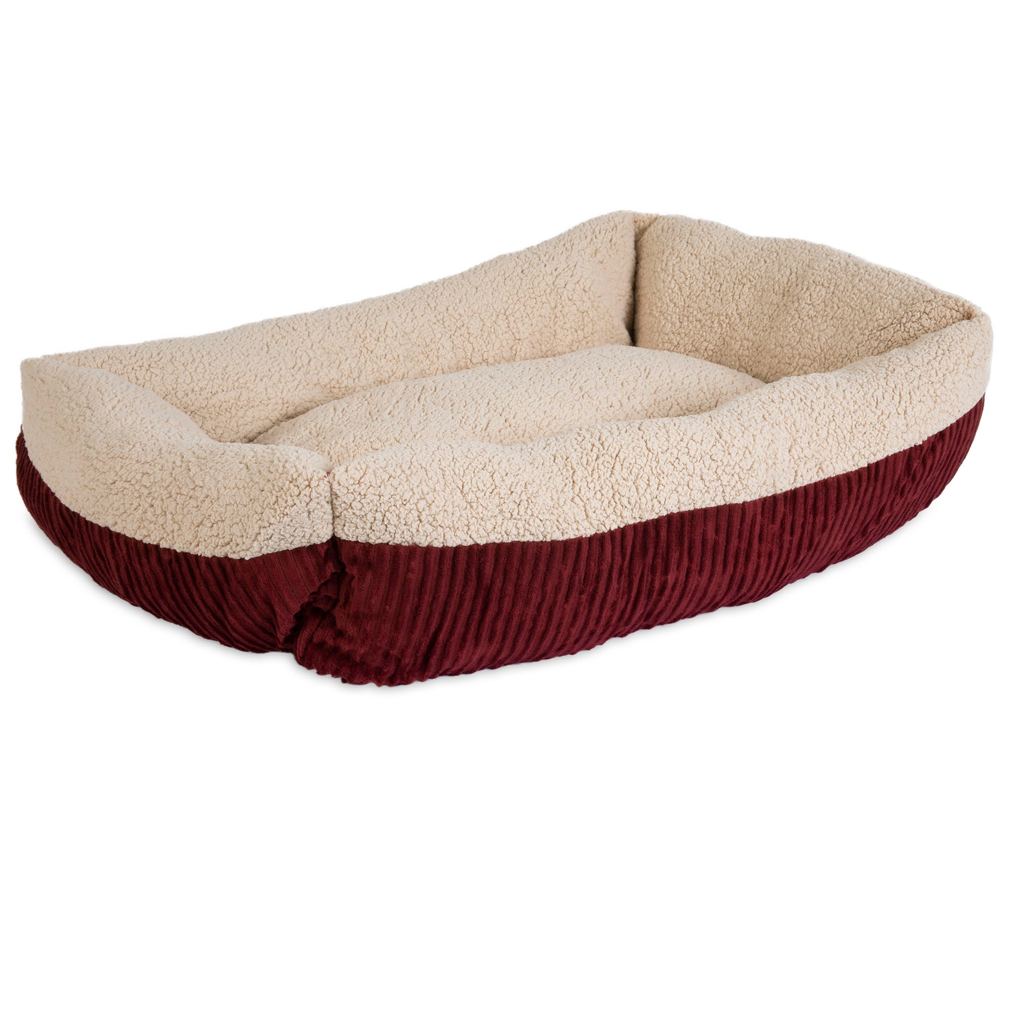 The Aspen Pet Self-Warming Bolster Mat by Aspen Pet is a plush, rectangular pet bed with high sides, featuring a deep red corduroy exterior and cream-colored fleece interior, ensuring a cozy resting space for pets.
