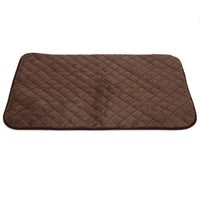 The SnooZZy Brown Quilted Kennel Mat by Snoozzy is a rectangular, dark brown mat made from super-soft plush fabric with a diamond pattern and rounded corners. Its perfect for kennels and conveniently machine washable for easy care.