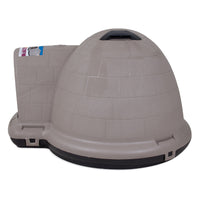 The Petmate Indigo Dog House by Petmate is a spacious, igloo-shaped beige plastic shelter for dogs. It boasts a rounded entrance on the left, a brick-like texture, and sits on a flat base with a top vent for airflow.
