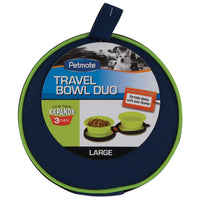 The Petmate Silicone Travel Bowl Duo packaging features collapsible green bowls, perfect for travel. It includes an image of a dog and emphasizes easy cleanup with a capacity of 3 cups. The blue and green design highlights its suitability as a travel pet accessory.