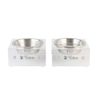 PetFusion Elevated Bowls For Dogs & Cats feature two stainless steel bowls set in clear acrylic stands with a cut-out pet FUSION logo. This design promotes healthier digestion and suits multi-pet households, offering an elevated feeding experience on a white background.