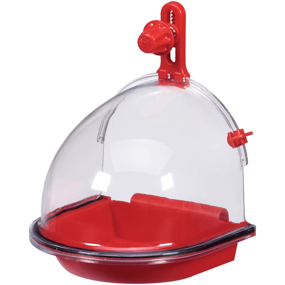 The JW Insight Bird Bath by Jw is a red dome-shaped feeder made from non-toxic plastic, designed to attract birds and protect them while eating. It features a clear protective cover, a red base, and an adjustable hook for easy hanging.